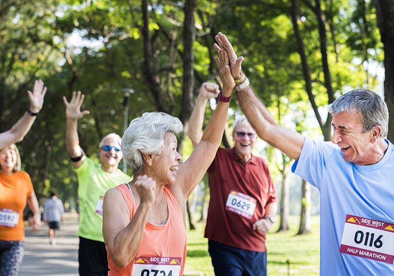 Mature runners running in a race